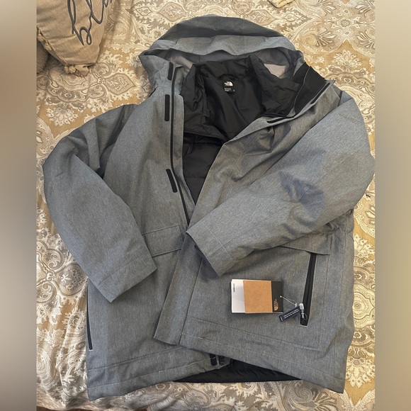 Men's XL Clement tri jacket. There is an internal down zip out jacket.